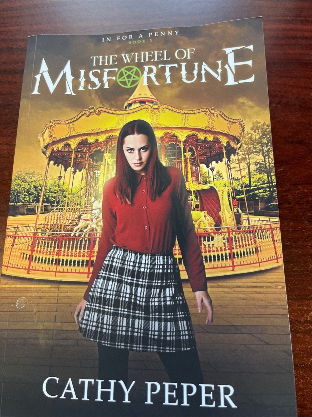 The wheel of misfortune by Cathy pepper